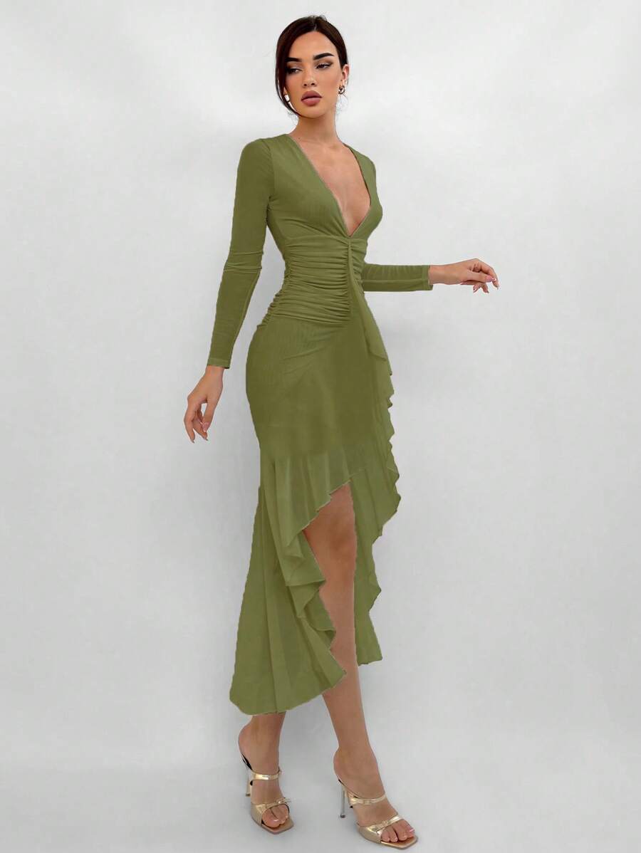 Celebrate your milestone moment in this stunning white graduation dress that's equal parts sophisticated and fun. The elegant slim fit flatters your silhouette while the deep V-neckline adds a touch of glamour. A ruched waist creates beautiful dimension, and the flounced hem gives you that perfect twirl-worthy finish. Whether you're walking across the stage or dancing at the after-party, this dress keeps you looking polished and feeling fabulous all day long.