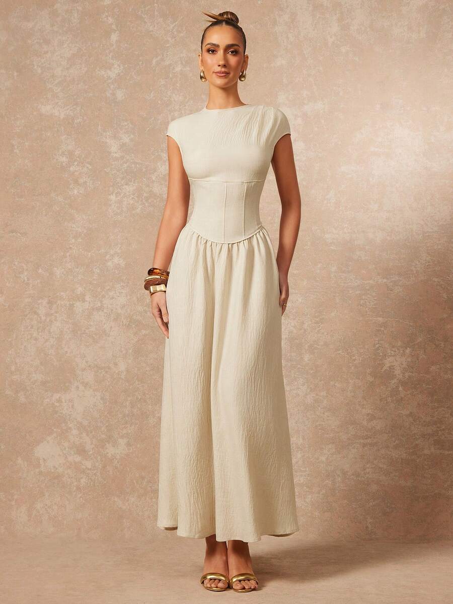 Exude Timeless Grace in Our Elegant Soft Ivory Corset Maxi Dress!

Step into a world of refined luxury with this breathtaking ivory masterpiece. Designed to evoke the romance of a bygone era while maintaining a modern, high-fashion edge, this dress is the ultimate choice for your most prestigious events and intimate celebrations.

Sculpted Boned Bodice: The masterfully crafted corset waist with internal boning provides structural support and a cinched silhouette, offering a regal and flattering fit that hig