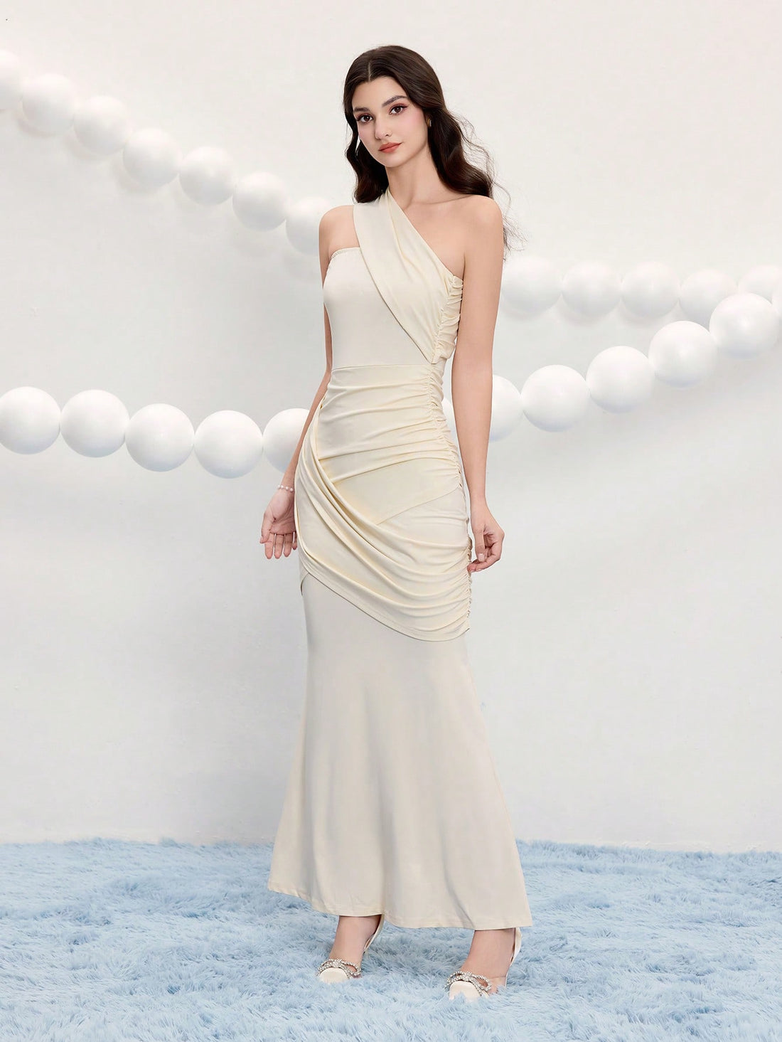 Make a statement at your next event in this stunning asymmetric cocktail dress. The sleek solid color and modern neckline create an effortlessly chic silhouette that flatters every figure. Whether you're heading to a wedding, party, or special occasion, this versatile evening gown delivers sophisticated style with a playful twist. Comfortable enough to dance the night away, yet polished enough to turn heads. Your go-to dress for unforgettable moments.