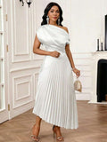 Elevate your everyday style with this sophisticated asymmetric shoulder dress. Crafted in a timeless solid color, this mid-length silhouette flatters with its modern one-shoulder design and flowing fabric. Perfect for transitioning from office to evening, it pairs effortlessly with heels or flats. The elegant cut creates a polished look that works for brunches, dinners, or special occasions. A versatile wardrobe essential that combines comfort with contemporary elegance.