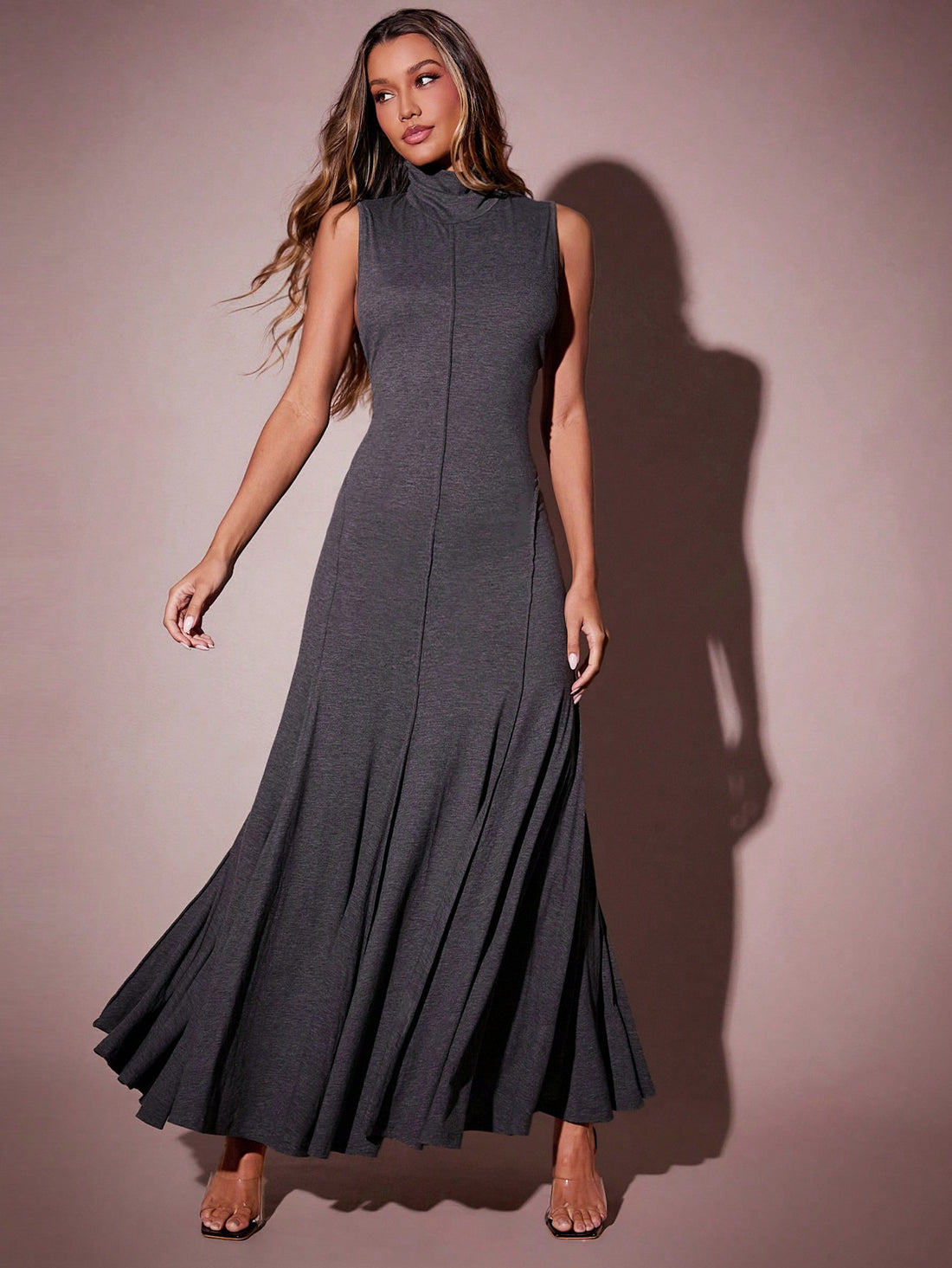 Turn heads this autumn in our Elegant Solid Color Backless Mermaid Dress. Featuring a chic stand collar and a flattering mermaid silhouette, it perfectly blends sophistication with a touch of daring thanks to its backless design. Cozy enough for cooler days yet effortlessly stylish, this dress is your new go-to for making any occasion feel special. Step out and let your confidence shine with every twirl!