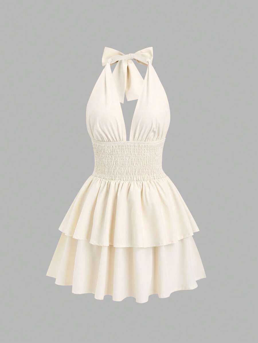 Step into the spotlight with this playful Y2K-inspired midi dress featuring a chic solid color and a flattering cinched waist. The open back and sling straps add a flirty touch, perfect for holiday parties or festive gatherings. Effortlessly stylish and comfortable, it’s your go-to dress for making memories and turning heads this Christmas season.