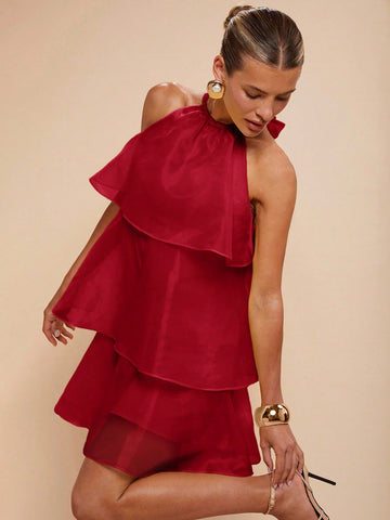 Slip into effortless summer glamour with this chic halter mini dress. Featuring a flattering solid color palette and timeless halter neckline, it's your go-to piece for warm-weather adventures. Whether you're heading to brunch, a beach party, or a casual night out, this versatile dress delivers style without the fuss. The mini length keeps things breezy and fun, while the sleek silhouette flatters every figure. Perfect for layering with sandals or statement jewelry to make it entirely your own.