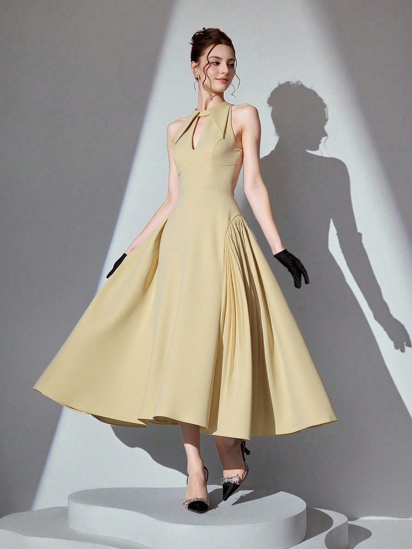 Step into the spotlight in this stunning halter neck ball gown that's pure magic! Crafted in a luxurious solid color, this showstopper features a flattering halter design that frames your shoulders beautifully while the voluminous skirt creates an enchanting silhouette. Whether you're dancing the night away at a gala, walking down the aisle, or making a grand entrance at your next formal event, this gown delivers elegance with a touch of whimsy. The timeless design ensures you'll feel like royalty, while th