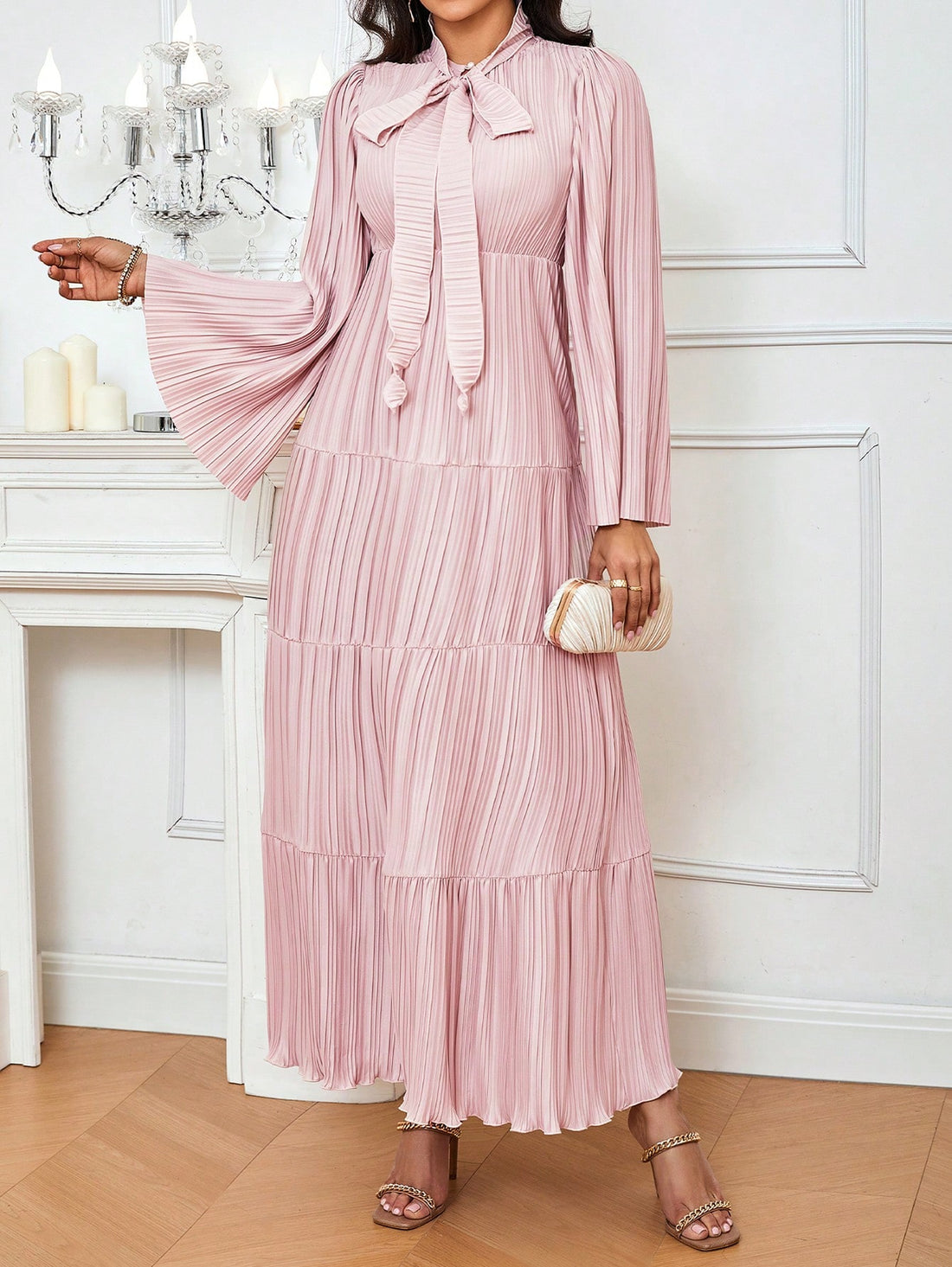 Step into the wedding party with effortless grace in this stunning bridesmaid dress. Featuring a chic knot collar detail and flattering pleated silhouette, this solid-color gown brings timeless elegance to any celebration. The refined design works beautifully for bridesmaids who want to look polished without overshadowing the bride. Perfect for creating a cohesive bridal party look that photographs beautifully and feels comfortable all day long.