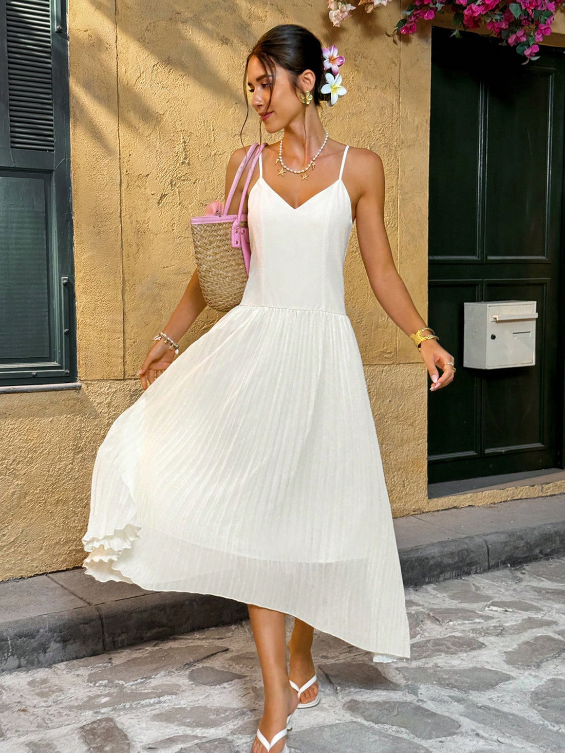 Step into summer with this playful and elegant solid color dress featuring delicate spaghetti straps and a charming pleated hem. Lightweight and breezy, it’s your perfect companion for sunny vacations or casual outings. Embrace effortless style and comfort wherever you go!