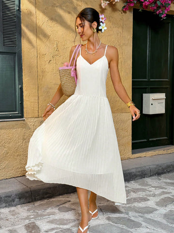 Step into summer with this playful and elegant solid color dress featuring delicate spaghetti straps and a charming pleated hem. Lightweight and breezy, it’s your perfect companion for sunny vacations or casual outings. Embrace effortless style and comfort wherever you go!