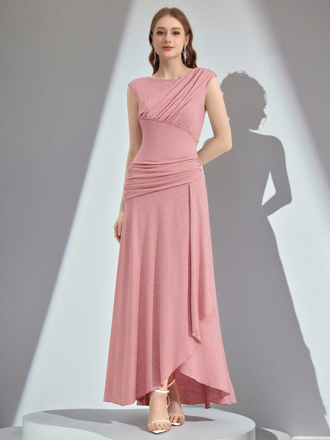 Make a grand entrance in this stunning ball gown that's pure magic! Featuring luxurious ruching that flatters every curve, this elegant solid-color dress transforms you into the star of any celebration. Whether you're walking down the aisle, crossing the graduation stage, or dancing the night away at a special event, this showstopper delivers timeless sophistication with a modern twist. The voluminous skirt creates that dreamy, fairy-tale silhouette you've always wanted, while the refined details ensure you