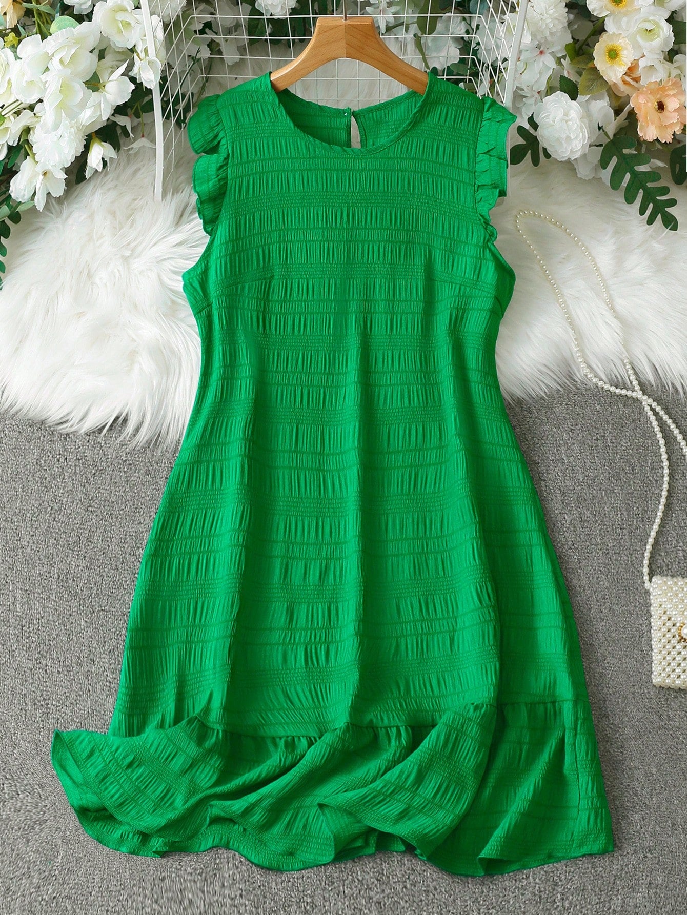 Make a stylish statement with this elegant short flutter sleeve dress for women. The solid color adds a touch of sophistication, while the flutter sleeves give it a playful and feminine touch. Perfect for any occasion, this dress is a must-have fashion piece. (Fashion meets functionality!)