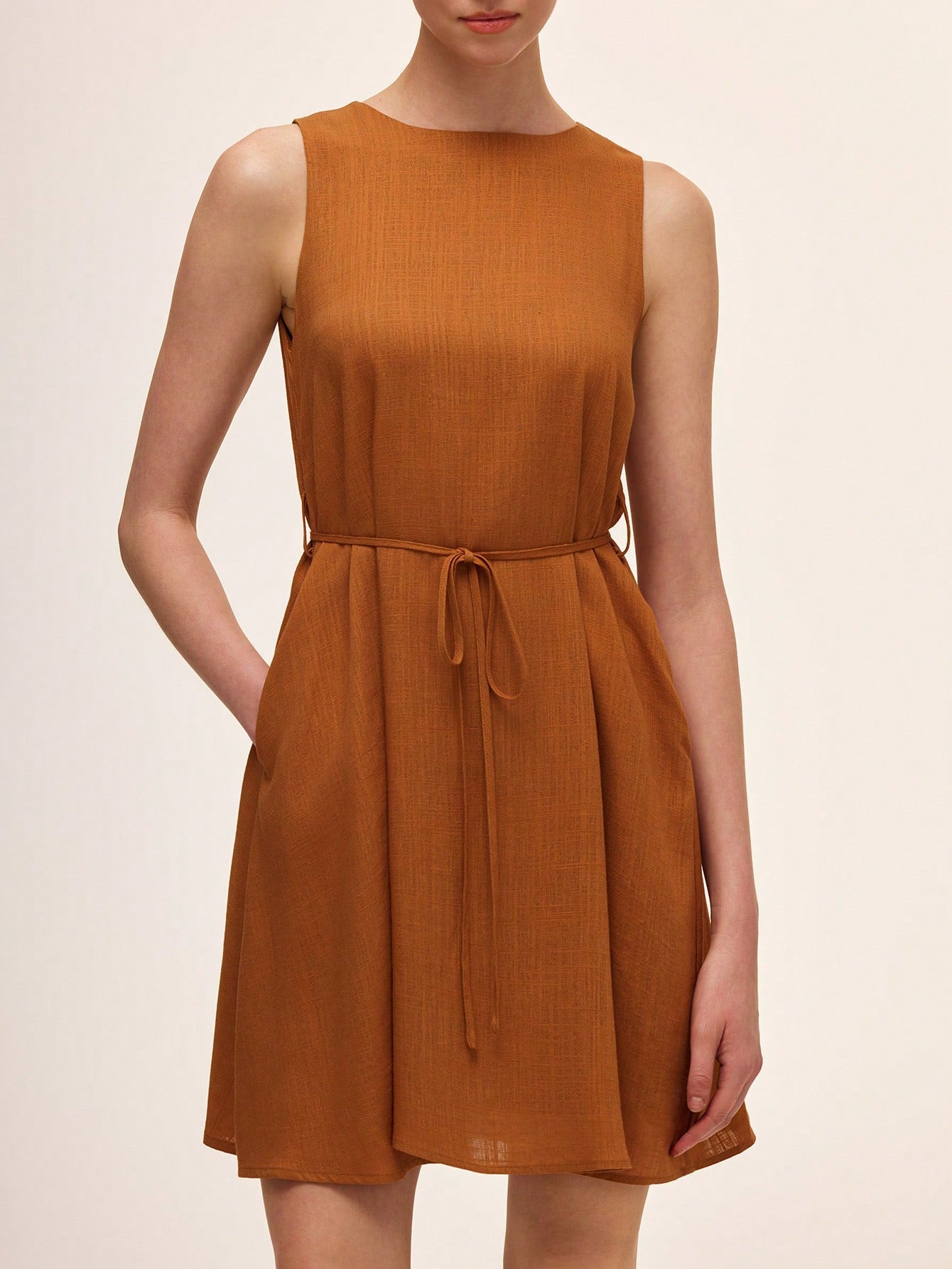 Step out in style with this elegant sleeveless dress featuring a classic round neck and a solid color that’s ready to brighten any occasion. Its simple yet chic design lets you mix and match accessories for a look that’s all your own. Whether it’s a brunch date or a night out, this dress keeps things effortlessly fabulous and fun!