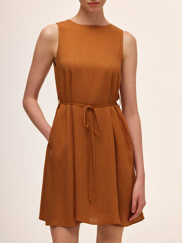 Step out in style with this elegant sleeveless dress featuring a classic round neck and a solid color that’s ready to brighten any occasion. Its simple yet chic design lets you mix and match accessories for a look that’s all your own. Whether it’s a brunch date or a night out, this dress keeps things effortlessly fabulous and fun!