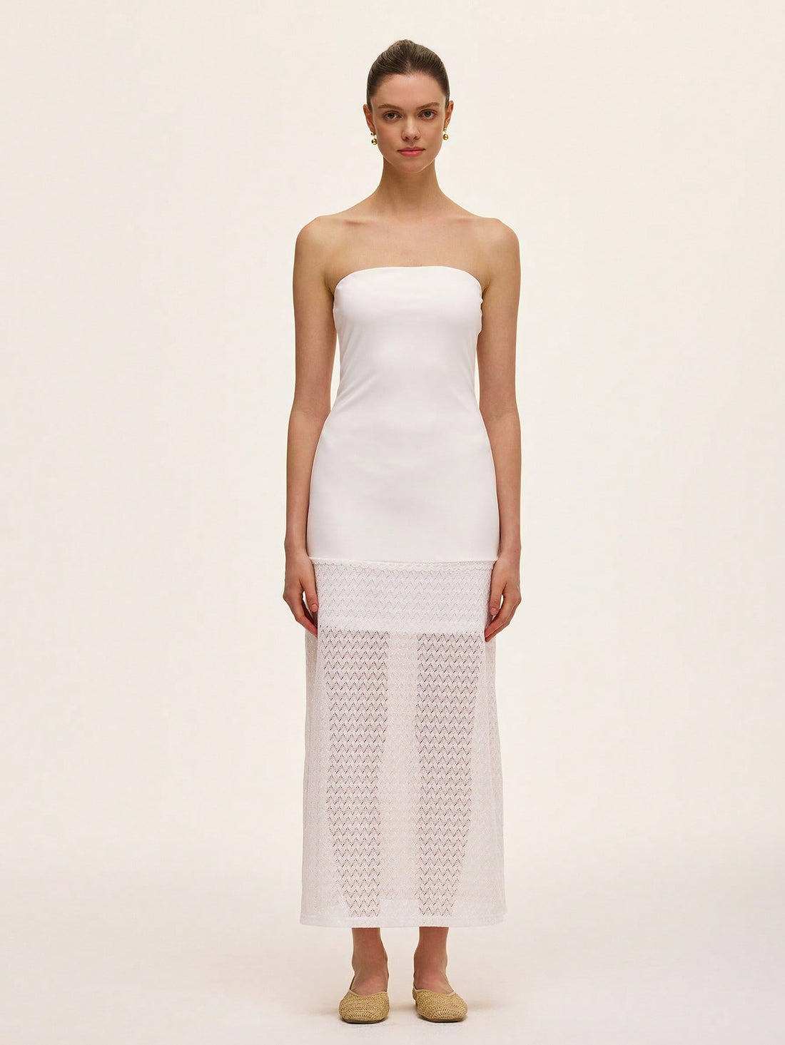 Step out in style with this elegant strapless dress featuring a solid color design and a delicate lace hollow hem. Perfect for turning heads at any event, its playful yet sophisticated look lets you dance the night away with confidence and charm.