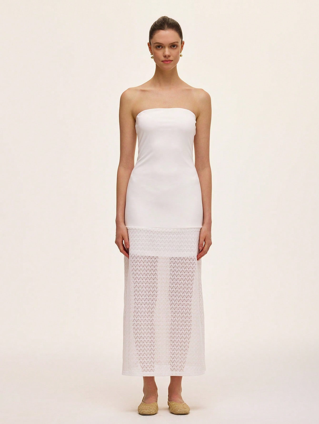 Step out in style with this elegant strapless dress featuring a solid color design and a delicate lace hollow hem. Perfect for turning heads at any event, its playful yet sophisticated look lets you dance the night away with confidence and charm.