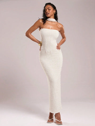 Be the talk of the town with our Elegant Solid Color Textured Bodycon Dress for Women! Perfect for special occasions, this dress features a unique textured design that adds a touch of sophistication. Stand out in style and comfort with this must-have dress. Get yours now!