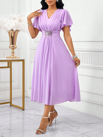 Step into summer celebrations with this Elegant Solid Color V-Neck Ruffle Sleeve Dress, designed to make you the star guest! Its playful ruffle sleeves add just the right flair, while the flattering V-neck keeps things chic and breezy. Perfectly tailored for weddings, this dress combines comfort with style so you can dance the night away with ease and grace.