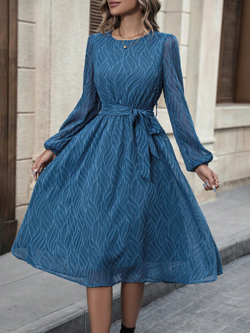 This dress is the epitome of timeless elegance. The solid color and lantern sleeves exude sophistication, while the belted waist adds a flattering touch. Perfect for any occasion, this dress will make you feel confident and stylish. Expertly crafted with quality materials, it's a must-have for any wardrobe.