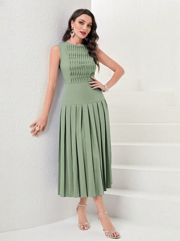 Twirl into the spotlight with this pleated-hem evening dress that's as fun as it is fancy! The flowing length creates dramatic movement while you dance the night away, and the solid color means endless accessorizing possibilities. Who says sophistication can't be playful? This dress proves you can command attention and have a blast doing it!