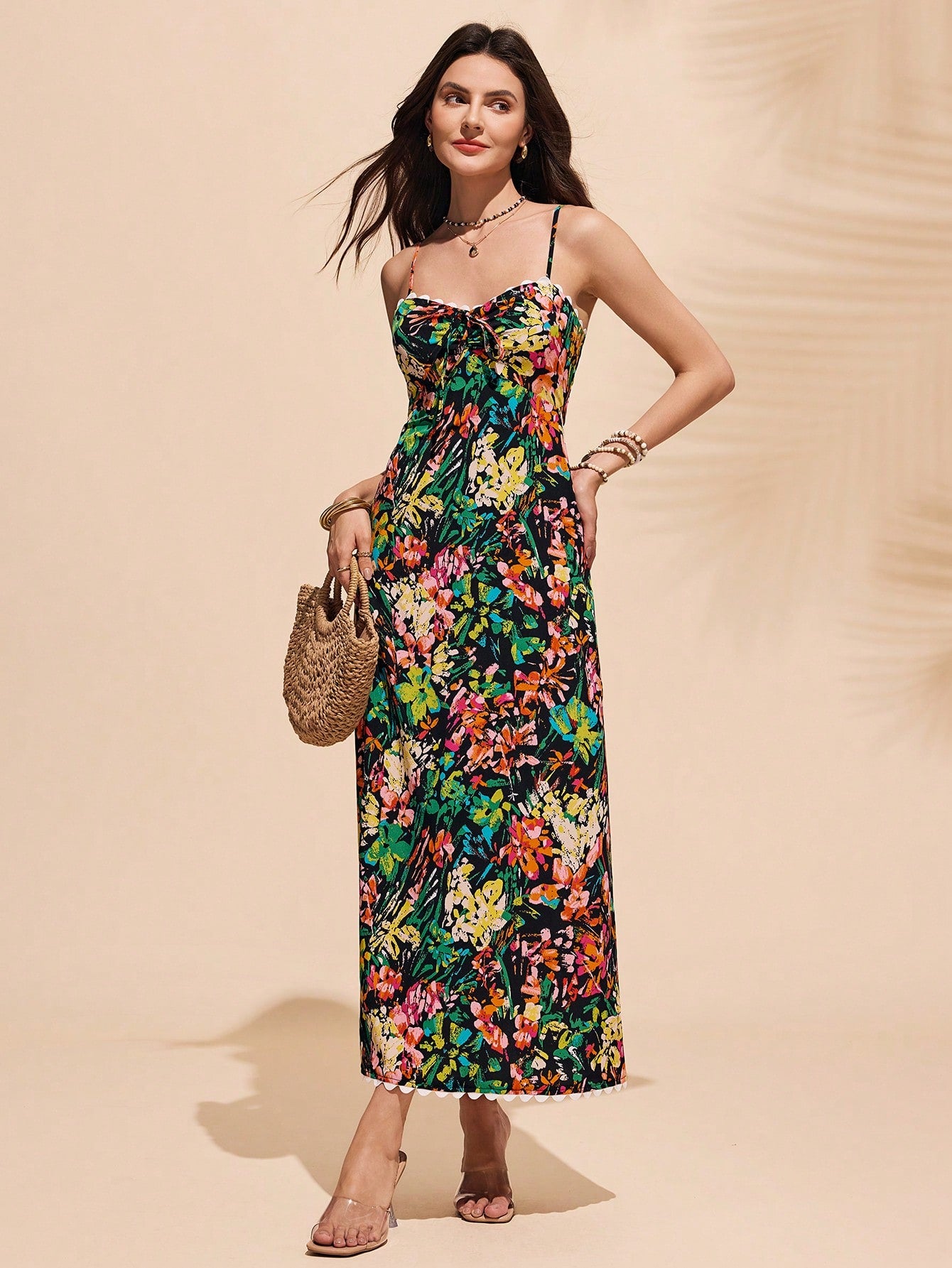 Get ready to turn heads with this elegant spaghetti strap beach dress! Perfect for any holiday outing, this dress is sure to keep you cool and stylish. With its delicate straps and flowy design, you'll feel like a true fashion icon. So go ahead and make a statement with this must-have dress!