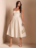Ivory midi dress with spaghetti straps sweetheart bust and pleated full skirt