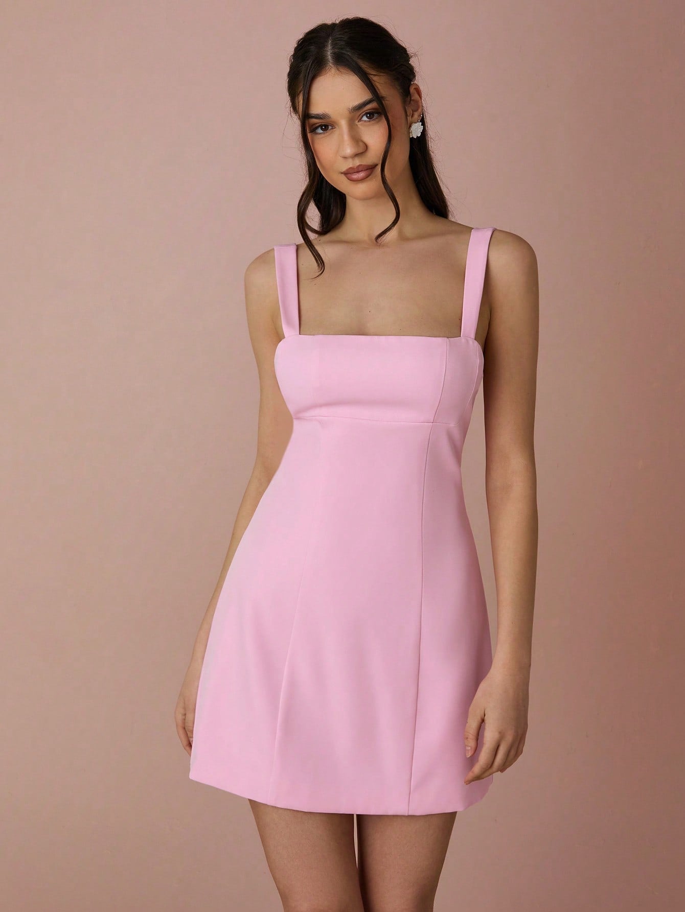 Shake up your wardrobe with our Elegant Pink Mini Dress. Perfect for spring and summer romances, the dress features a dramatic back bow detail that will have heads turning. Get ready for some fun and flirty dates with this playful and stylish dress.