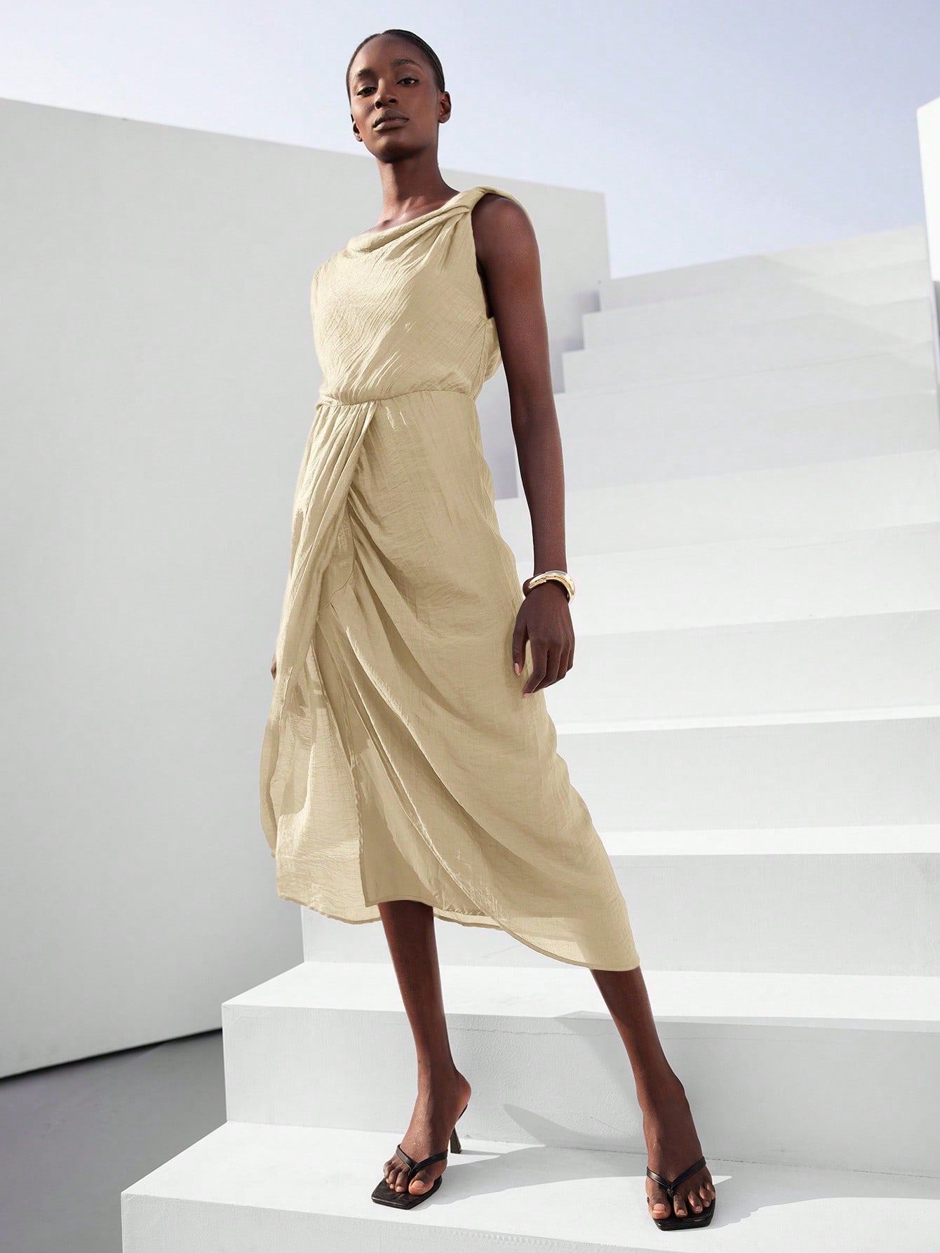 Step into spring with this playful and elegant vacation dress designed to turn heads. Featuring an asymmetrical scoop neck and a daring high split, it combines comfort with a flirty edge. Perfect for sunny days and breezy evenings, this dress lets you move freely while showcasing your style with a fun, confident flair. Ideal for beach strolls or garden parties, it’s your go-to piece for effortless charm all season long.