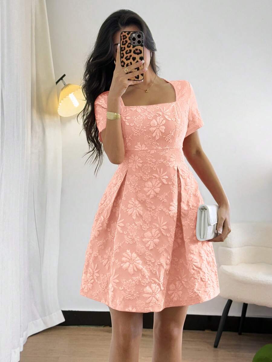 Be the life of the party in our Elegant Jacquard Mini Dress. With its stylish square neck and ruffle hem, you'll turn heads wherever you go. Perfect for any occasion, this dress will show off your playful and stylish side. Don't miss out, add this quirky and fun dress to your wardrobe now!