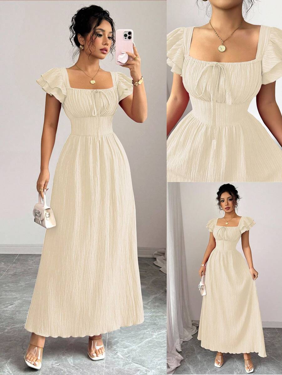 Experience the breathtaking fusion of romantic heritage and sharp, modern architectural tailoring. This stunning bow-tie back ensemble is meticulously designed for the woman who values a high-fashion, "quiet luxury" approach to seasonal dressing—the ultimate centerpiece for prestigious garden retreats, exclusive coastal soirées, and high-authority summer outings.