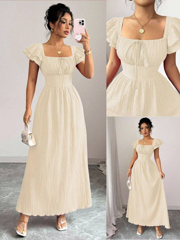 Experience the breathtaking fusion of romantic heritage and sharp, modern architectural tailoring. This stunning bow-tie back ensemble is meticulously designed for the woman who values a high-fashion, "quiet luxury" approach to seasonal dressing—the ultimate centerpiece for prestigious garden retreats, exclusive coastal soirées, and high-authority summer outings.