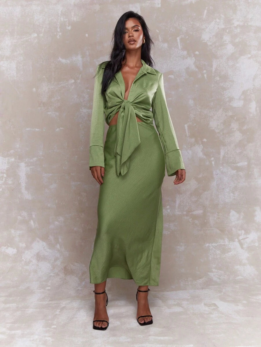 Celebrate in style with this stunning two-piece set designed for St. Patrick's Day magic! The luxurious satin crop top pairs perfectly with a flowing maxi skirt, creating an effortlessly chic silhouette that turns heads at any Irish-themed gathering. Whether you're hitting the parade or hosting a festive party, this playful ensemble brings elegance and spirit to your holiday wardrobe. The smooth satin fabric drapes beautifully while the cropped top adds a modern, flirty touch. Get lucky in green and make th