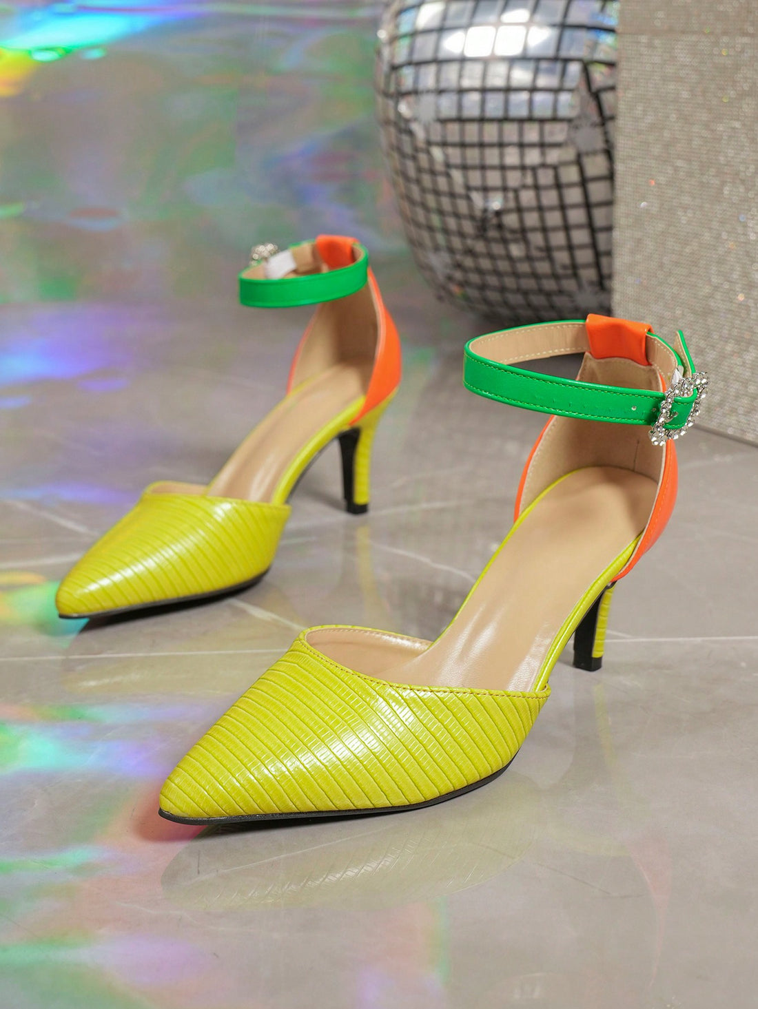 These Elegant Stone Pattern Yellow Satin Pointed Toe High Heels for Women feature a stylish stone pattern and a flattering pointed toe design. Made with high-quality satin material, these heels are perfect for adding a touch of elegance to any outfit. With a comfortable fit and eye-catching design, these heels are a must-have for any fashion-forward woman.