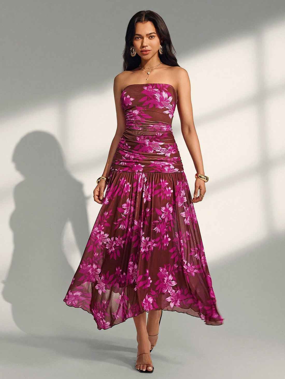 Escape to paradise in this stunning strapless floral dress that's basically a vacation in fabric form. The vibrant botanical print brings instant tropical vibes, while the elegant strapless design keeps things chic and effortless. Whether you're sipping cocktails by the ocean or exploring a charming coastal town, this versatile piece transitions seamlessly from beach days to sunset dinners. The flowing silhouette flatters every figure and moves beautifully in the breeze. Pack it, wear it, love it—your beach