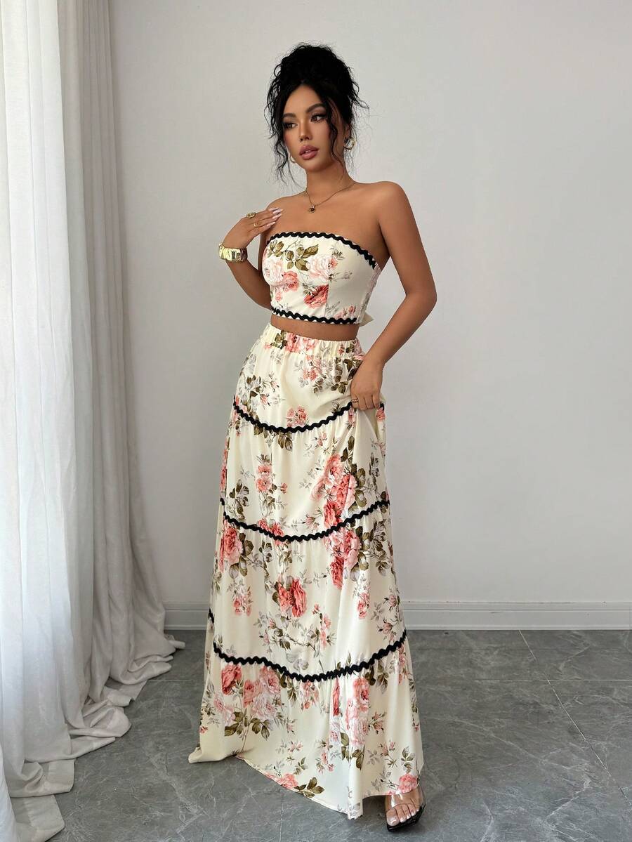 Elevate your seasonal wardrobe with this stunning strapless set, designed for effortless elegance. The coordinated top and skirt combination features a flattering silhouette perfect for holiday gatherings, spring brunches, or summer celebrations.