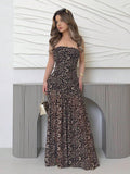 Turn heads at your next event in this stunning strapless bodycon dress. The bold leopard print adds a touch of wild sophistication, while the sleek silhouette hugs your curves for a flattering, confident look. 