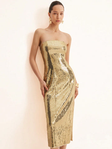 Turn heads and sparkle all night in this Elegant Strapless Sequin Bodycon Dress. Perfect for romantic dates or formal events, its shimmering sequins and figure-hugging fit make you feel confident and dazzling. Slip into this playful yet sophisticated dress and let your style shine!