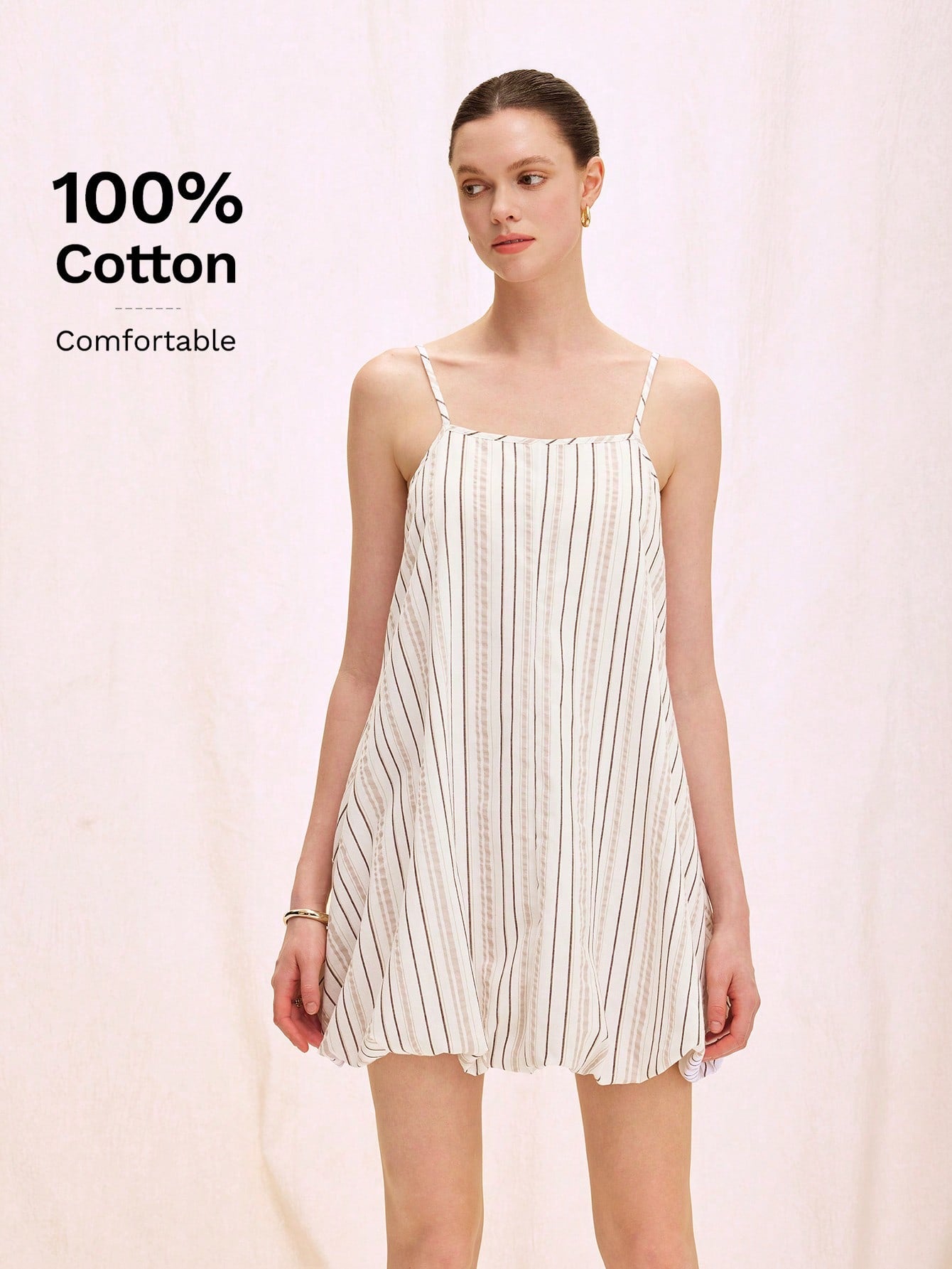 Step into sunshine with this playful midi dress featuring charming stripes and delicate floral patterns. Adjustable spaghetti straps let you find the perfect fit, while the flowing silhouette keeps you twirling through any occasion with ease and style. Perfect for brunch dates or garden parties, this dress brings a fresh, fun vibe to your wardrobe.