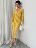 Front full view of mustard and white striped rib-knit midi dress with scoop neck and gold button front