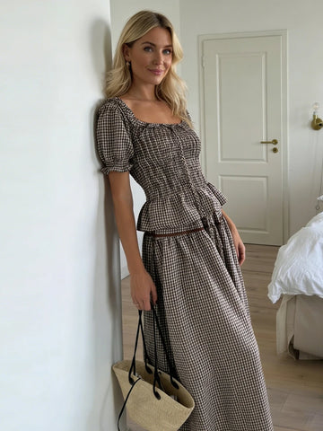 Embrace effortless bohemian style with this charming two-piece set. The square neck ruffle blouse features delicate detailing and a relaxed silhouette, while the floral lace skirt adds romantic flair. Perfect for warm weather gatherings, beach outings, or casual summer adventures. 