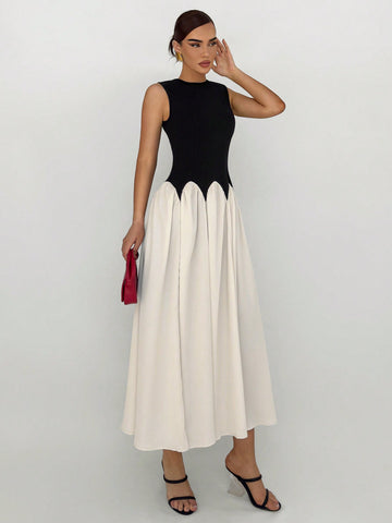 Step into summer with our Elegant Summer Chic: Color Block Sleeveless Dress. Composed of high-quality materials, this dress offers effortless style and comfort. The color block design adds a touch of sophistication while the sleeveless cut keeps you cool and chic. Perfect for any occasion, this dress is a must-have for your summer wardrobe.