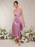 Get ready to turn heads with our Elegant Summer Gingham Plaid Satin Asymmetric Ruffle Sun Dress for Women! This playful dress features a unique gingham plaid pattern and ruffled asymmetrical hem, perfect for adding a touch of fun to your summer wardrobe. Made with soft satin fabric, this dress is not only stylish but also comfortable to wear. Don't miss out on this one-of-a-kind dress that will make you stand out in any crowd!