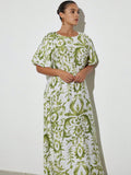 Step into sunshine with this playful green linen dress, adorned with charming plant prints that bring a fresh, natural vibe. Its relaxed fit ensures all-day comfort, perfect for breezy summer days or casual outings. Lightweight and breathable, this dress combines style and ease effortlessly, making it your go-to choice for warm-weather fun.