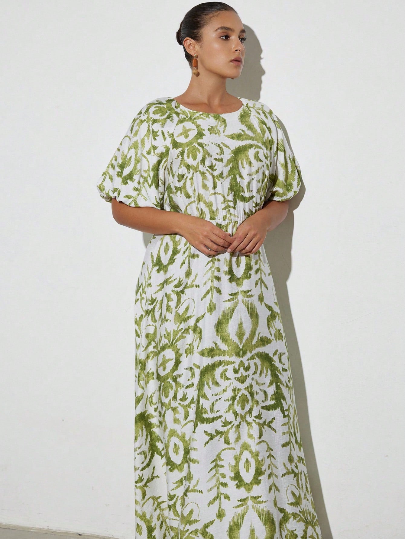 Step into sunshine with this playful green linen dress, adorned with charming plant prints that bring a fresh, natural vibe. Its relaxed fit ensures all-day comfort, perfect for breezy summer days or casual outings. Lightweight and breathable, this dress combines style and ease effortlessly, making it your go-to choice for warm-weather fun.