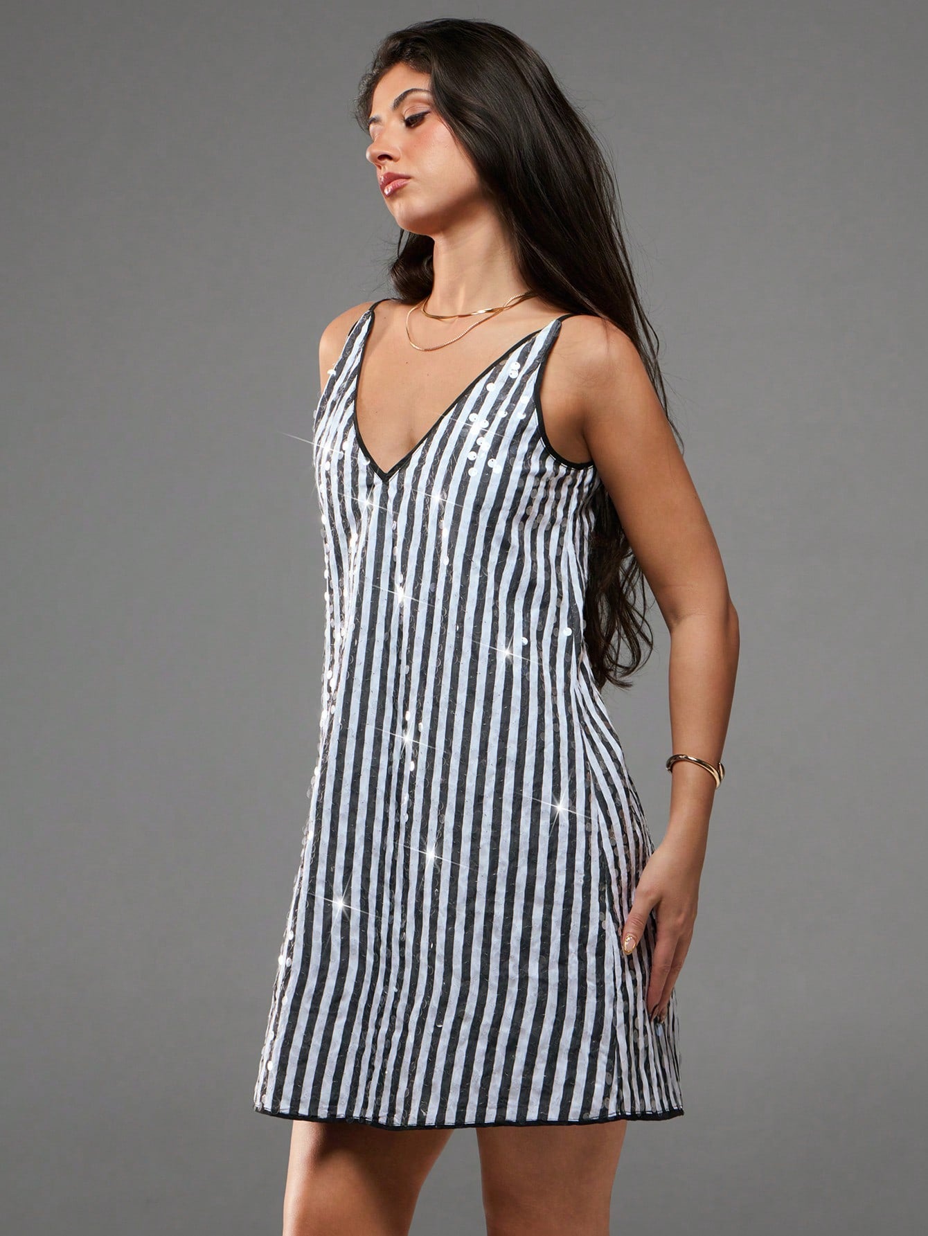 Step into summer with this playful and elegant mini dress designed for every occasion. Whether you're dancing at prom, strolling along the beach, or lighting up a party, this versatile dress combines comfort and style effortlessly. Its flattering cut and breezy fabric keep you cool and confident, making it your go-to choice for sunny days and lively nights. Embrace the season with a dress that’s as fun and vibrant as you are!