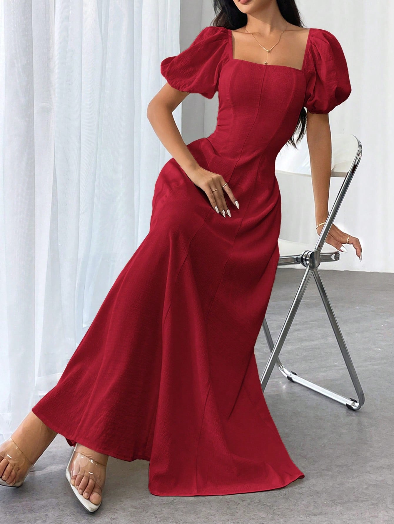 This elegant summer dress features a square neckline and bishop sleeves, creating a timeless and sophisticated look. Made for women, this dress is perfect for any occasion. The solid color allows for versatile styling options. Elevate your wardrobe with this dress for a chic and stylish summer.