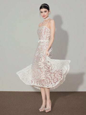 Step into sunshine with this playful mid-length dress crafted from soft jacquard knit. Its delicate spaghetti straps and elegant silhouette make it perfect for summer days and breezy evenings. Light, comfortable, and effortlessly chic, this dress adds a flirty touch to your warm-weather wardrobe.