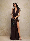 Make a statement in this stunning party dress designed to turn heads. The daring deep V-neck halter creates an alluring focal point, while the flowing A-line silhouette with a thigh-high split offers both elegance and movement. Perfect for cocktail events, celebrations, or any occasion where you want to feel confident and fabulous. This dress combines sophisticated tailoring with a touch of boldness—ideal for those ready to embrace their inner glamour.
