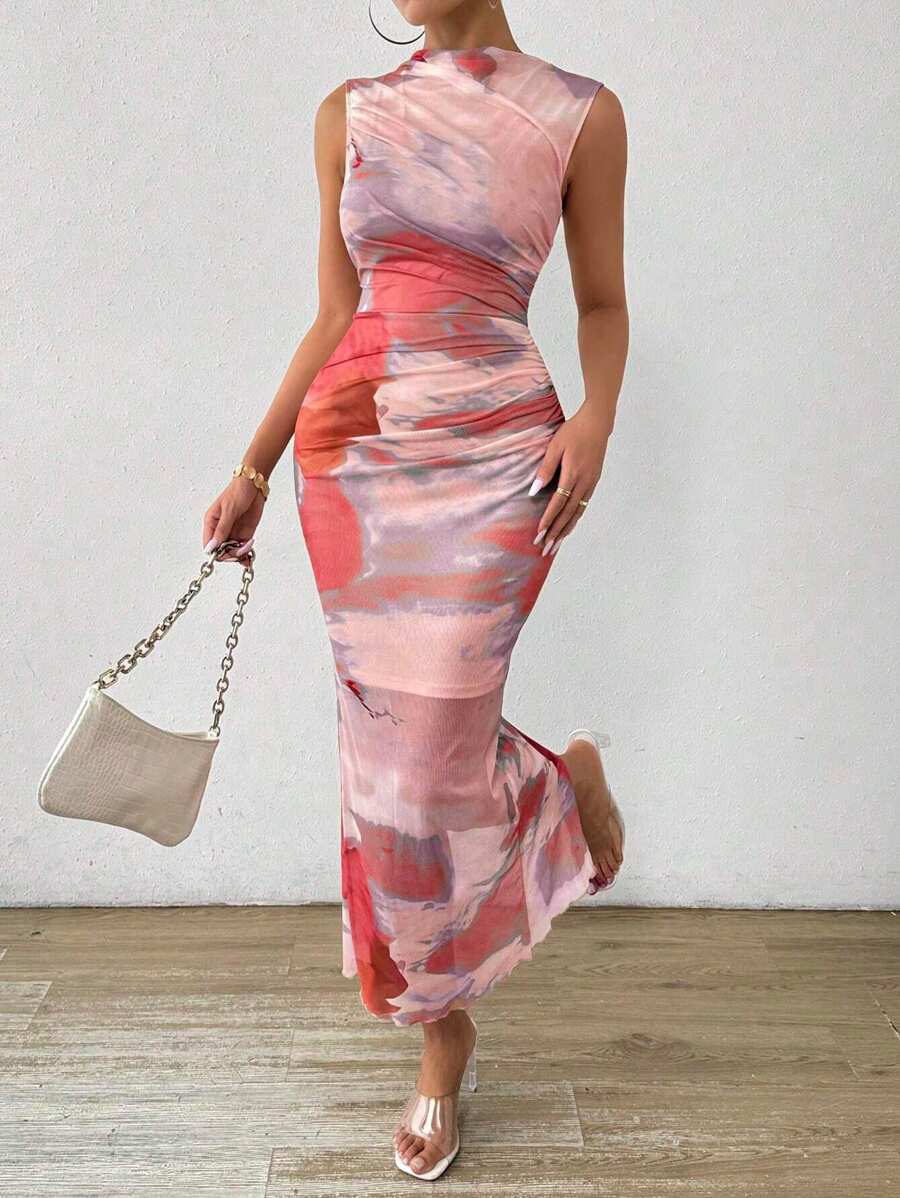 Turn heads in this stunning tie dye bodycon maxi dress that effortlessly blends artistry with sophistication. The sleek sleeveless silhouette flatters your figure while the gathered waist creates a gorgeous defined shape. Vibrant tie dye patterns make each piece uniquely yours, perfect for making a bold statement at parties, events, or whenever you want to feel absolutely fabulous. Slip it on and let your confidence shine as bright as the colors!
