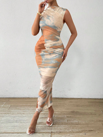 Make a statement in our Elegant Tie Dye Maxi Dress! This trendy fashion outfit features a ruched, fitted design for a flattering silhouette. Perfect for any occasion, add a touch of elegance to your wardrobe with this unique dress.