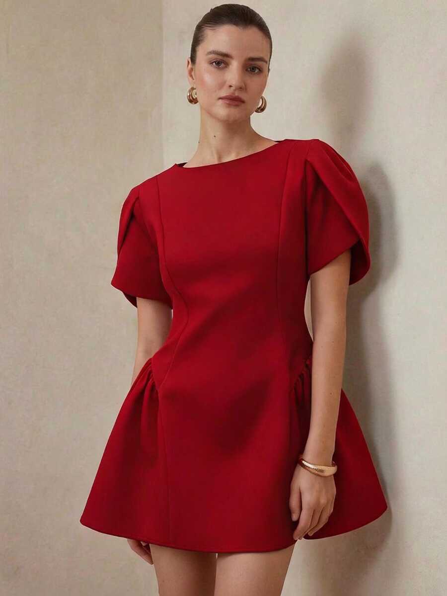 Front view of red puff sleeve A-line mini dress with a fitted bodice and flared skirt