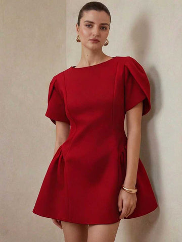 Front view of red puff sleeve A-line mini dress with a fitted bodice and flared skirt