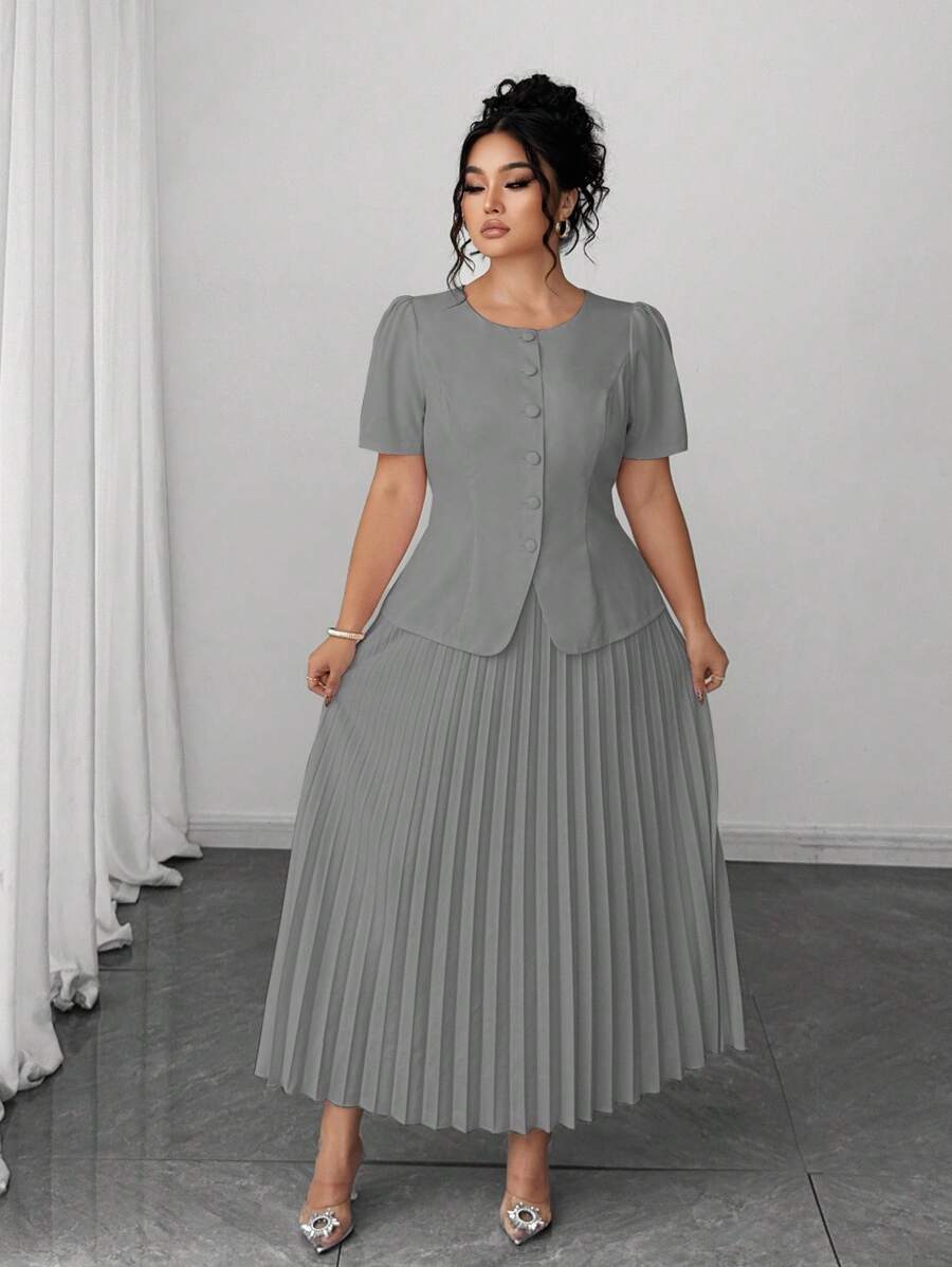 Embrace effortless elegance with this charming two-piece pleated skirt set that captures the essence of French romance. The delicate pleating creates graceful movement with every step, while the coordinated pieces work together to deliver a polished, put-together look. Perfect for summer gatherings, casual outings, or those moments when you want to feel undeniably chic without trying too hard. This set proves that timeless style never goes out of fashion—just slip it on and let the compliments flow.